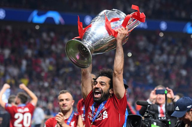 Mo Salah Holding Champions League Cup